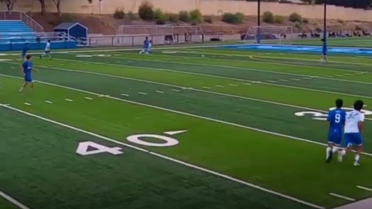 Still from a real evaluation: soccer game film reviewed by a college coach