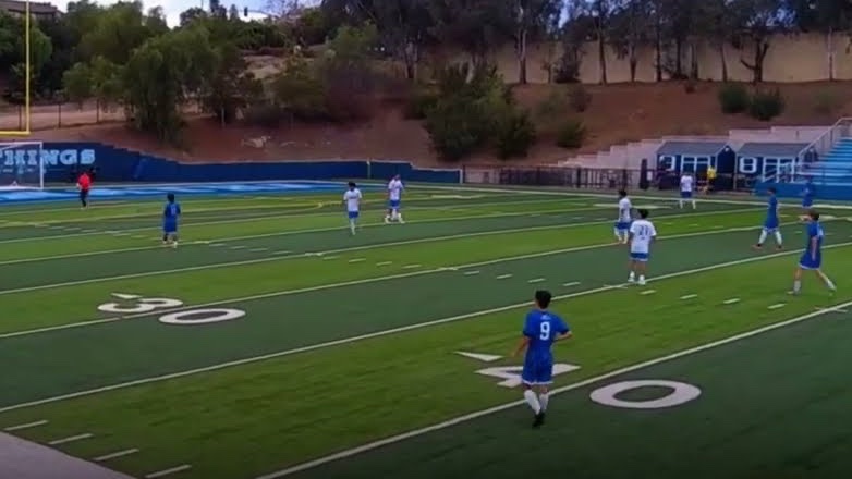 Still from a real evaluation: soccer game film reviewed by a college coach
